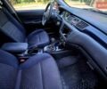 Червоний Міцубісі Лансер Еволюшн, об'ємом двигуна 2 л та пробігом 148 тис. км за 27000 $, фото 10 на Automoto.ua