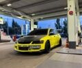 Червоний Міцубісі Лансер Еволюшн, об'ємом двигуна 2 л та пробігом 130 тис. км за 45000 $, фото 1 на Automoto.ua