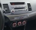 Красный Мицубиси Лансер Эволюшн, объемом двигателя 2 л и пробегом 56 тыс. км за 29000 $, фото 22 на Automoto.ua