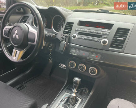 Красный Мицубиси Лансер Эволюшн, объемом двигателя 2 л и пробегом 110 тыс. км за 17000 $, фото 7 на Automoto.ua