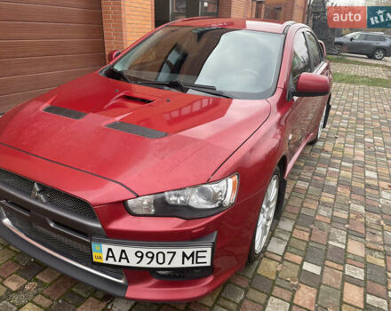 Красный Мицубиси Лансер Эволюшн, объемом двигателя 2 л и пробегом 110 тыс. км за 17000 $, фото 4 на Automoto.ua