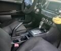 Красный Мицубиси Лансер Эволюшн, объемом двигателя 2 л и пробегом 259 тыс. км за 7700 $, фото 7 на Automoto.ua