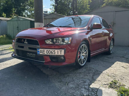 Міцубісі Лансер Еволюшн 2008 у Дніпро (Дніпропетровську) на Automoto.ua Червоний Міцубісі Лансер Еволюшн, об'ємом двигуна 2 л та пробігом 137 тис. км за 20000 $, фото 1 на Automoto.ua