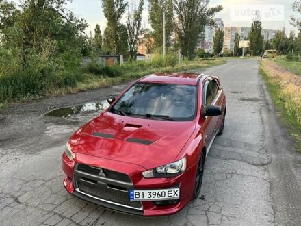 Міцубісі Лансер Еволюшн 2008 у Кременчуге на Automoto.ua Червоний Міцубісі Лансер Еволюшн, об'ємом двигуна 2 л та пробігом 102 тис. км за 16000 $, фото 1 на Automoto.ua