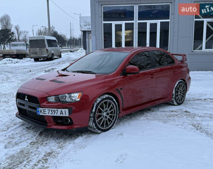Червоний Міцубісі Лансер Еволюшн, об'ємом двигуна 2 л та пробігом 105 тис. км за 16700 $, фото 1 на Automoto.ua