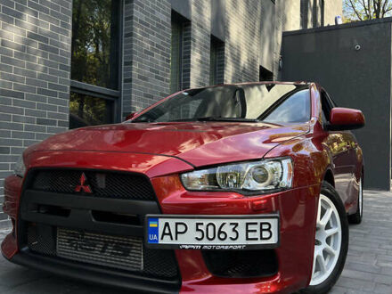 Міцубісі Лансер Еволюшн 2009 у Дніпро (Дніпропетровську) на Automoto.ua Червоний Міцубісі Лансер Еволюшн, об'ємом двигуна 2 л та пробігом 129 тис. км за 28500 $, фото 1 на Automoto.ua
