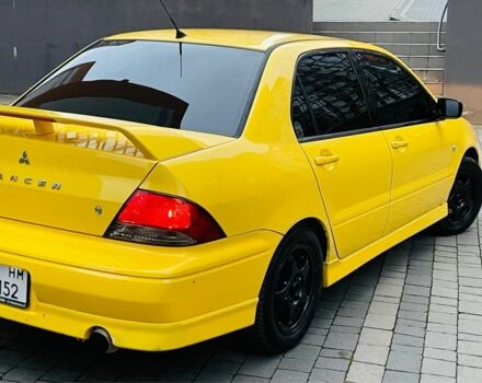 Жовтий Міцубісі Лансер Еволюшн, об'ємом двигуна 2 л та пробігом 160 тис. км за 3999 $, фото 1 на Automoto.ua