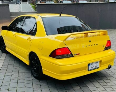 Жовтий Міцубісі Лансер Еволюшн, об'ємом двигуна 2 л та пробігом 160 тис. км за 3999 $, фото 7 на Automoto.ua