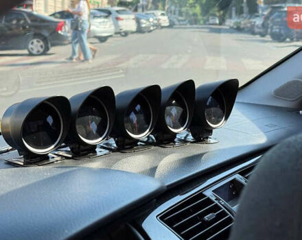 Жовтий Міцубісі Лансер Еволюшн, об'ємом двигуна 2 л та пробігом 124 тис. км за 32000 $, фото 11 на Automoto.ua