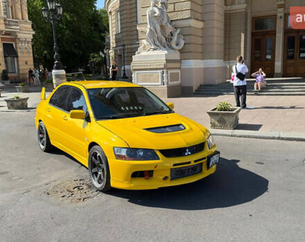 Жовтий Міцубісі Лансер Еволюшн, об'ємом двигуна 2 л та пробігом 124 тис. км за 32000 $, фото 19 на Automoto.ua