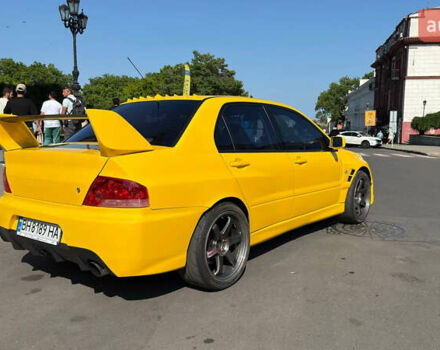 Жовтий Міцубісі Лансер Еволюшн, об'ємом двигуна 2 л та пробігом 124 тис. км за 32000 $, фото 27 на Automoto.ua