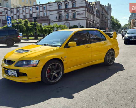 Жовтий Міцубісі Лансер Еволюшн, об'ємом двигуна 2 л та пробігом 124 тис. км за 32000 $, фото 21 на Automoto.ua