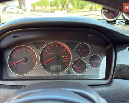 Жовтий Міцубісі Лансер Еволюшн, об'ємом двигуна 2 л та пробігом 124 тис. км за 32000 $, фото 14 на Automoto.ua