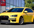 Жовтий Міцубісі Лансер Еволюшн, об'ємом двигуна 2 л та пробігом 180 тис. км за 24999 $, фото 2 на Automoto.ua