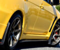 Желтый Мицубиси Лансер Эволюшн, объемом двигателя 2 л и пробегом 180 тыс. км за 24999 $, фото 25 на Automoto.ua