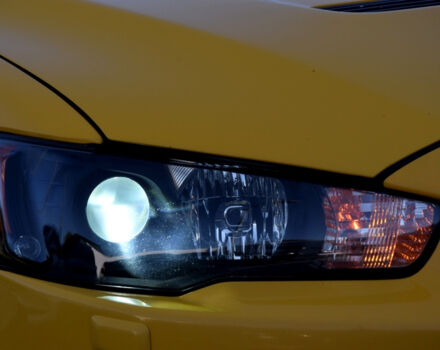 Жовтий Міцубісі Лансер Еволюшн, об'ємом двигуна 2 л та пробігом 180 тис. км за 24999 $, фото 87 на Automoto.ua