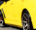 Желтый Мицубиси Лансер Эволюшн, объемом двигателя 2 л и пробегом 180 тыс. км за 24999 $, фото 24 на Automoto.ua