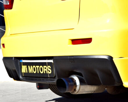 Желтый Мицубиси Лансер Эволюшн, объемом двигателя 2 л и пробегом 180 тыс. км за 24999 $, фото 32 на Automoto.ua