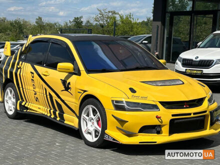 Міцубісі Лансер Еволюшн 2004 у Чернівцях на Automoto.ua Жовтий Міцубісі Лансер Еволюшн, об'ємом двигуна 2 л та пробігом 134 тис. км за 19600 $, фото 1 на Automoto.ua
