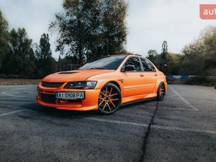 Міцубісі Лансер Еволюшн 2007 у Києві на Automoto.ua Жовтий Міцубісі Лансер Еволюшн, об'ємом двигуна 2 л та пробігом 100 тис. км за 40000 $, фото 1 на Automoto.ua