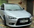 Серый Мицубиси Лансер Эволюшн, объемом двигателя 2 л и пробегом 270 тыс. км за 4200 $, фото 1 на Automoto.ua