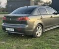 Серый Мицубиси Лансер Эволюшн, объемом двигателя 2 л и пробегом 1 тыс. км за 6500 $, фото 3 на Automoto.ua
