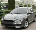 Серый Мицубиси Лансер Эволюшн, объемом двигателя 1.5 л и пробегом 200 тыс. км за 6599 $, фото 1 на Automoto.ua