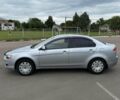 Серый Мицубиси Лансер Эволюшн, объемом двигателя 1.5 л и пробегом 63 тыс. км за 9900 $, фото 1 на Automoto.ua