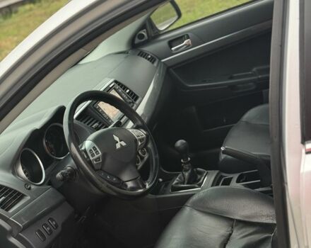 Серый Мицубиси Лансер Эволюшн, объемом двигателя 2 л и пробегом 300 тыс. км за 3500 $, фото 6 на Automoto.ua