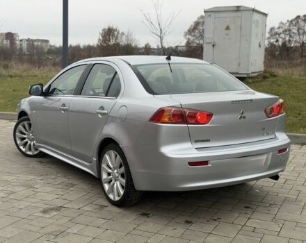 Серый Мицубиси Лансер Эволюшн, объемом двигателя 2 л и пробегом 300 тыс. км за 3500 $, фото 2 на Automoto.ua