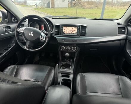 Серый Мицубиси Лансер Эволюшн, объемом двигателя 2 л и пробегом 300 тыс. км за 3500 $, фото 4 на Automoto.ua