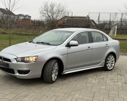 Серый Мицубиси Лансер Эволюшн, объемом двигателя 2 л и пробегом 300 тыс. км за 3500 $, фото 1 на Automoto.ua