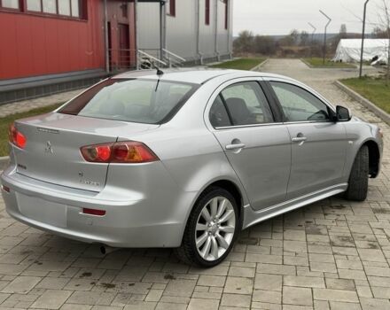 Серый Мицубиси Лансер Эволюшн, объемом двигателя 2 л и пробегом 300 тыс. км за 3500 $, фото 3 на Automoto.ua