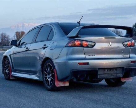 Сірий Міцубісі Лансер Еволюшн, об'ємом двигуна 2 л та пробігом 99 тис. км за 9100 $, фото 6 на Automoto.ua