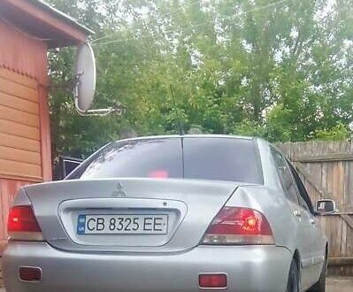 Міцубісі Лансер Еволюшн 2005 у Кролевце на Automoto.ua Сірий Міцубісі Лансер Еволюшн, об'ємом двигуна 1.6 л та пробігом 300 тис. км за 4350 $, фото 1 на Automoto.ua