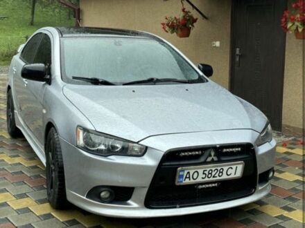 Сірий Міцубісі Лансер Еволюшн, об'ємом двигуна 2 л та пробігом 270 тис. км за 4200 $, фото 1 на Automoto.ua