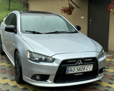 Сірий Міцубісі Лансер Еволюшн, об'ємом двигуна 2 л та пробігом 270 тис. км за 4200 $, фото 1 на Automoto.ua
