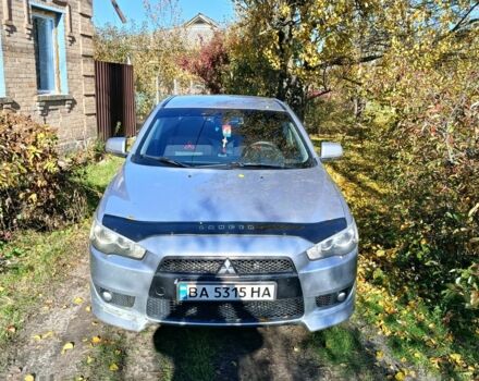 Серый Мицубиси Лансер Эволюшн, объемом двигателя 2 л и пробегом 230 тыс. км за 6600 $, фото 1 на Automoto.ua