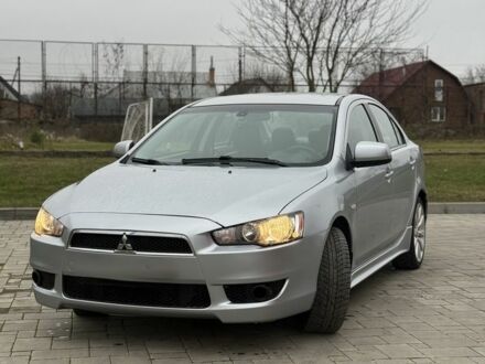 Серый Мицубиси Лансер Эволюшн, объемом двигателя 2 л и пробегом 300 тыс. км за 3500 $, фото 1 на Automoto.ua