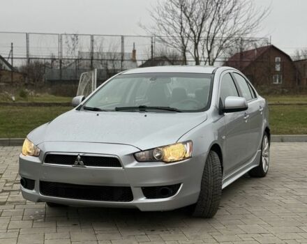 Серый Мицубиси Лансер Эволюшн, объемом двигателя 2 л и пробегом 300 тыс. км за 3500 $, фото 1 на Automoto.ua