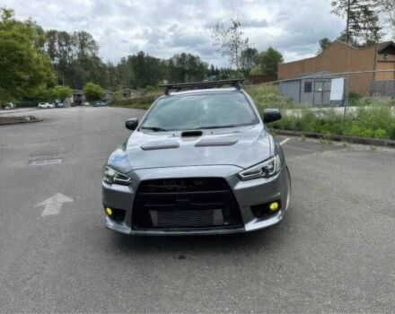 Серый Мицубиси Лансер Эволюшн, объемом двигателя 2 л и пробегом 143 тыс. км за 6500 $, фото 1 на Automoto.ua