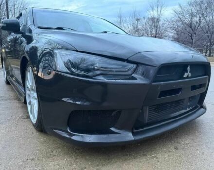 Сірий Міцубісі Лансер Еволюшн, об'ємом двигуна 2 л та пробігом 74 тис. км за 6500 $, фото 1 на Automoto.ua