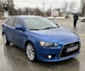 Синій Міцубісі Лансер Еволюшн, об'ємом двигуна 2 л та пробігом 212 тис. км за 8999 $, фото 2 на Automoto.ua