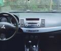 Синий Мицубиси Лансер Эволюшн, объемом двигателя 1.5 л и пробегом 260 тыс. км за 5200 $, фото 4 на Automoto.ua
