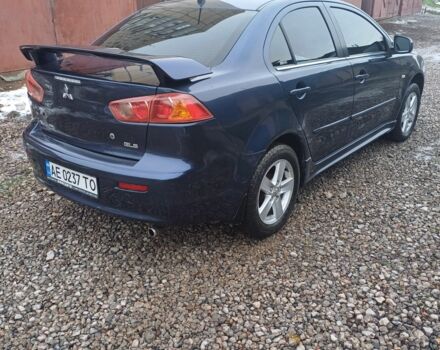Синий Мицубиси Лансер Эволюшн, объемом двигателя 1.5 л и пробегом 210 тыс. км за 6600 $, фото 3 на Automoto.ua