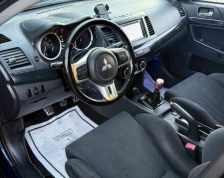 Синий Мицубиси Лансер Эволюшн, объемом двигателя 2 л и пробегом 144 тыс. км за 11000 $, фото 8 на Automoto.ua