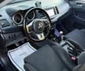 Синий Мицубиси Лансер Эволюшн, объемом двигателя 2 л и пробегом 144 тыс. км за 11000 $, фото 8 на Automoto.ua