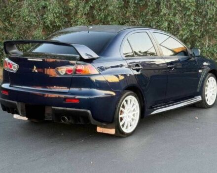 Синий Мицубиси Лансер Эволюшн, объемом двигателя 2 л и пробегом 144 тыс. км за 11000 $, фото 6 на Automoto.ua