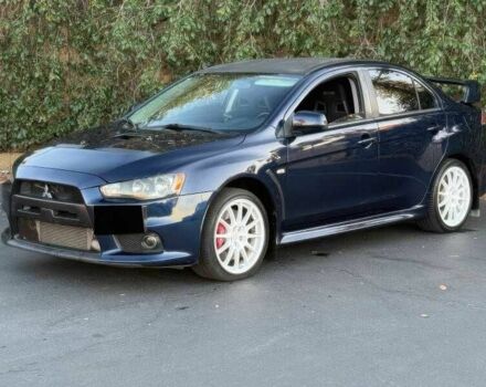 Синий Мицубиси Лансер Эволюшн, объемом двигателя 2 л и пробегом 144 тыс. км за 11000 $, фото 2 на Automoto.ua
