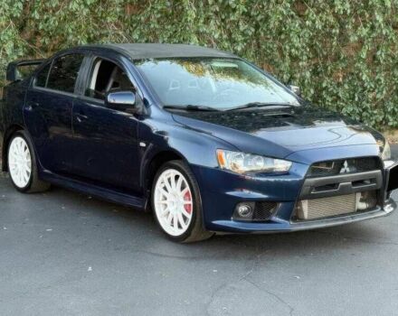 Синий Мицубиси Лансер Эволюшн, объемом двигателя 2 л и пробегом 144 тыс. км за 11000 $, фото 1 на Automoto.ua
